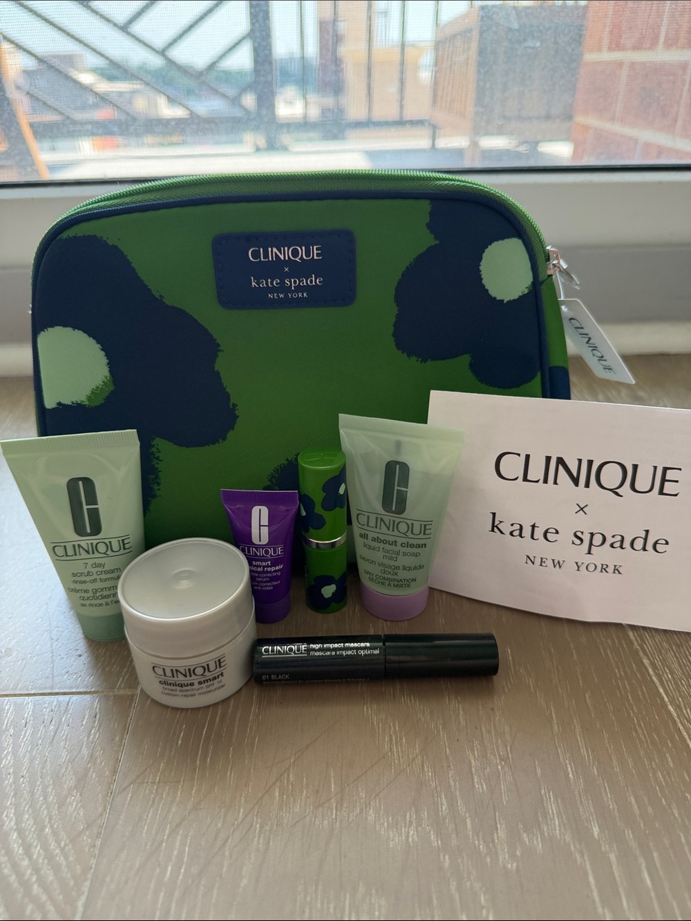 NWT Clinique Kate Spade Makeup Pouch and travel size skin and makeup products